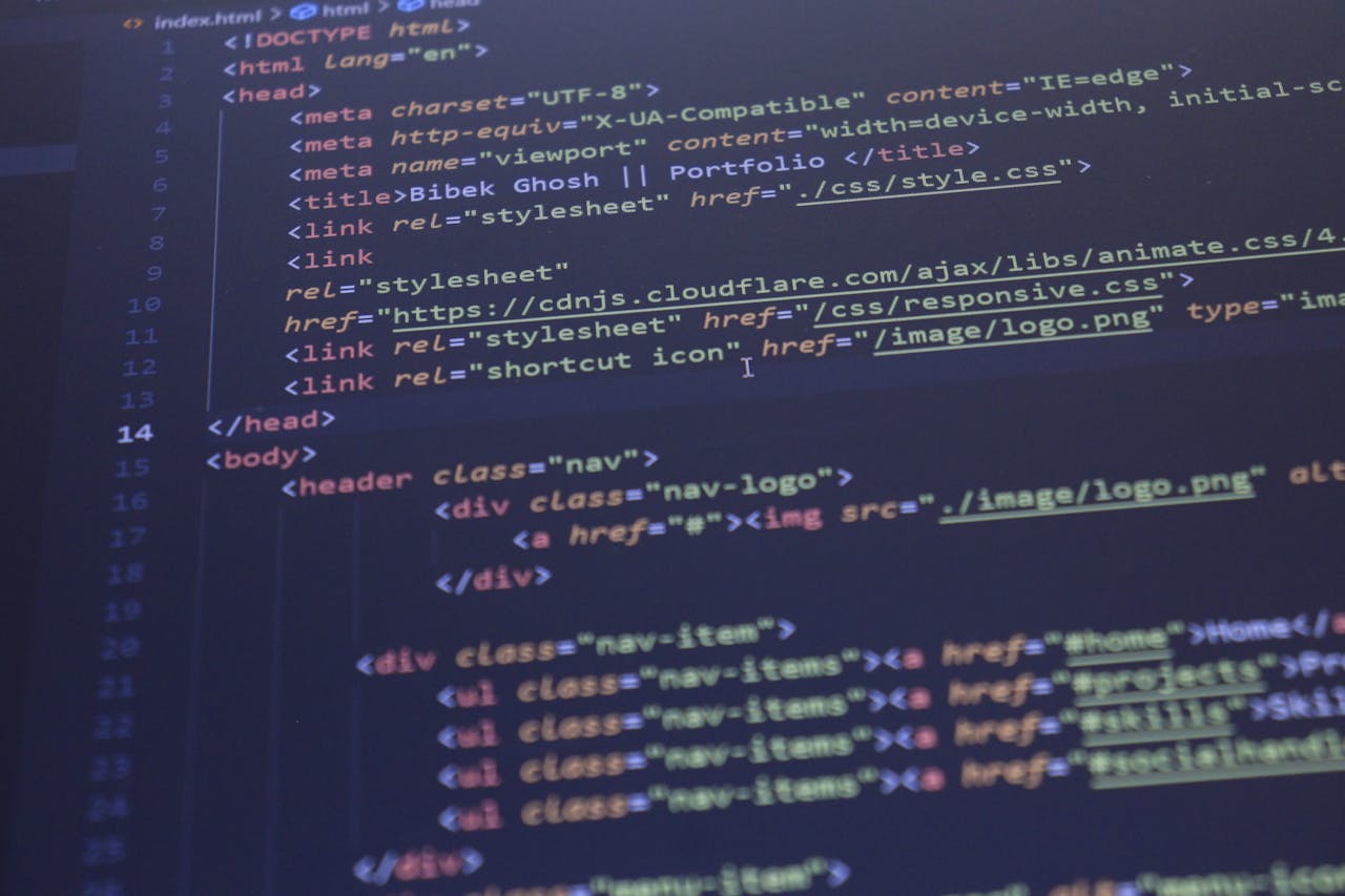 service-06 Close-up view of HTML and CSS code displayed on a computer screen, ideal for programming and technology themes.